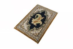 Corner detail of 2000s Ghom rug showing border pattern and Cork pile