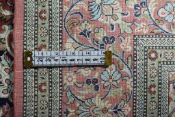 Backside of handmade 1970s Ghom rug showing knot structure and weave density