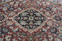 Central medallion detail of 1970s Ghom rug from Iran / Persia