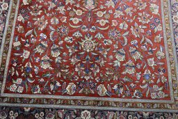 Central medallion detail of 1970s Ghom rug from Iran / Persia