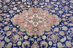 Central medallion detail of 2000s Ghom rug from Iran / Persia