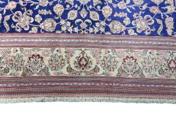 Full view of 2000s Ghom rug from Iran / Persia, 198 × 133 cm in Blue tones