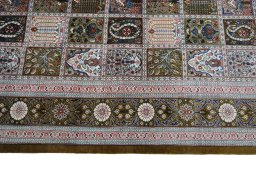 Close-up detail of New Ghom rug from Iran / Persia showing Silk weave