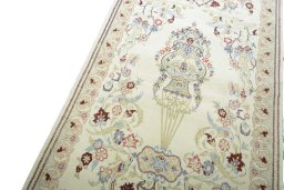 Backside of handmade New Ghom rug showing knot structure and weave density