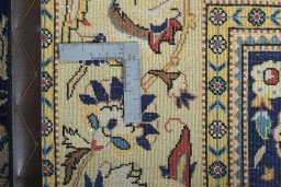 Backside of handmade New Ghom rug showing knot structure and weave density