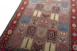 Backside of handmade New Ghom rug showing knot structure and weave density