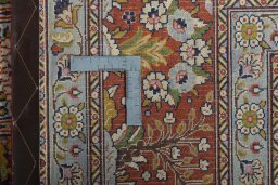 Close-up detail of New Ghom rug from Iran / Persia showing Wool weave