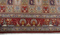 Central medallion detail of New Ghom rug from Iran / Persia