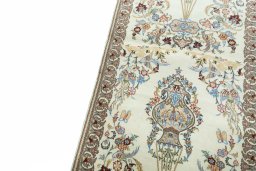 Backside of handmade New Ghom rug showing knot structure and weave density
