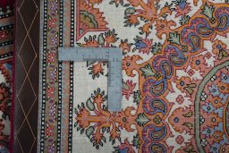 Surface texture of New Ghom rug with natural Cork and intricate pattern