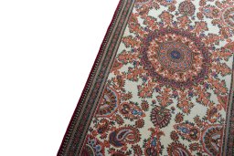 Backside of handmade New Ghom rug showing knot structure and weave density