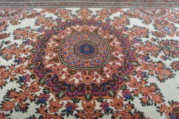 Central medallion detail of New Ghom rug from Iran / Persia
