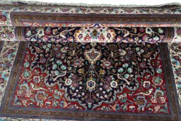 Close-up detail of 1970s Ghom rug from Iran / Persia showing Silk weave