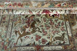 Close-up detail of 2000s Ghom rug from Iran / Persia showing Silk weave