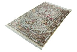 Corner detail of 2000s Ghom rug showing border pattern and Silk pile