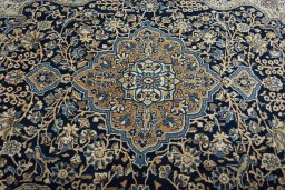 Central medallion detail of 1970s Ghom rug from Iran / Persia