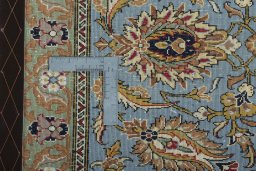 Backside of handmade 1950s Ghom rug showing knot structure and weave density