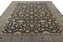 Surface texture of 1950s Ghom rug with natural Cork and intricate pattern