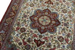 Backside of handmade 2000s Ghom rug showing knot structure and weave density