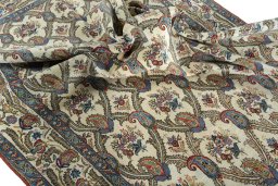 Corner detail of 1950s Ghom rug showing border pattern and Wool pile