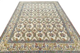 Surface texture of 1950s Ghom rug with natural Wool and intricate pattern