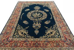 Surface texture of 1970s Ghom rug with natural Wool and intricate pattern
