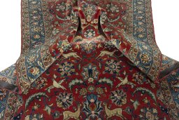 Surface texture of 1970s Ghom rug with natural Wool and intricate pattern