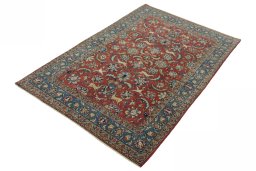 Corner detail of 1970s Ghom rug showing border pattern and Wool pile