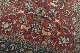 Close-up detail of 1970s Ghom rug from Iran / Persia showing Wool weave