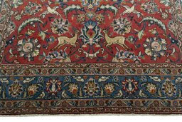 Full view of 1970s Ghom rug from Iran / Persia, 211 × 141 cm in Red tones