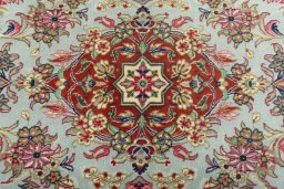 Central medallion detail of New Ghom rug from Iran / Persia