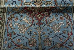 Close-up detail of 1970s Ghom rug from Iran / Persia showing Wool weave