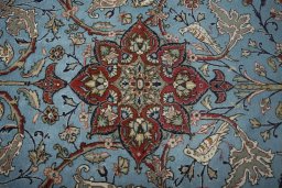 Central medallion detail of 1970s Ghom rug from Iran / Persia