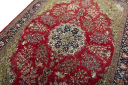 Backside of handmade New Ghom rug showing knot structure and weave density