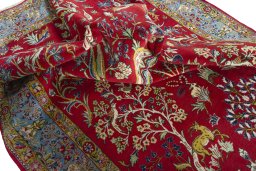 Surface texture of 1970s Ghom rug with natural Wool and intricate pattern