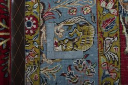 Backside of handmade 1970s Ghom rug showing knot structure and weave density