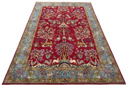 Surface texture of 1970s Ghom rug with natural Wool and intricate pattern