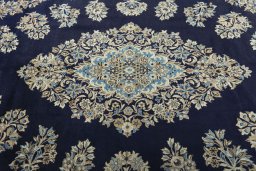 Central medallion detail of 2000s Ghom rug from Iran / Persia