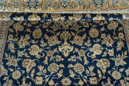 Close-up detail of 1950s Ghom rug from Iran / Persia showing Cork weave