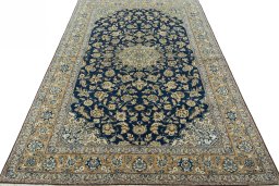 Surface texture of 1950s Ghom rug with natural Cork and intricate pattern