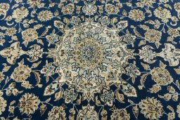 Central medallion detail of 1950s Ghom rug from Iran / Persia