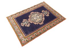 Close-up detail of 2001s Ghom rug from Iran / Persia showing Wool weave