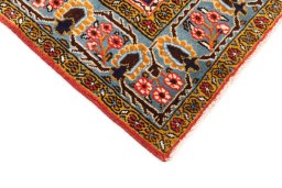 Central medallion detail of 2001s Ghom rug from Iran / Persia