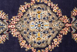 Full view of 2001s Ghom rug from Iran / Persia, 147 × 103 cm in Dark blue tones