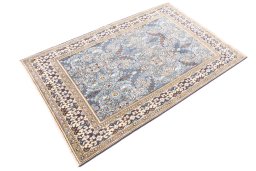 Corner detail of 1999s Ghom rug showing border pattern and Wool pile
