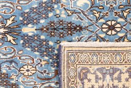 Close-up detail of 1999s Ghom rug from Iran / Persia showing Wool weave