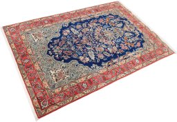 Corner detail of 1980s Ghom rug showing border pattern and Wool pile