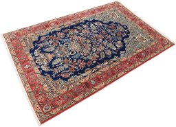 Close-up detail of 1980s Ghom rug from Iran / Persia showing Wool weave