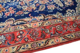 Backside of handmade 1980s Ghom rug showing knot structure and weave density