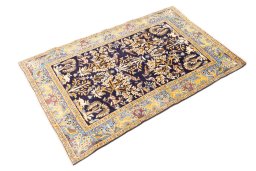 Corner detail of 2001s Ghom rug showing border pattern and Wool pile